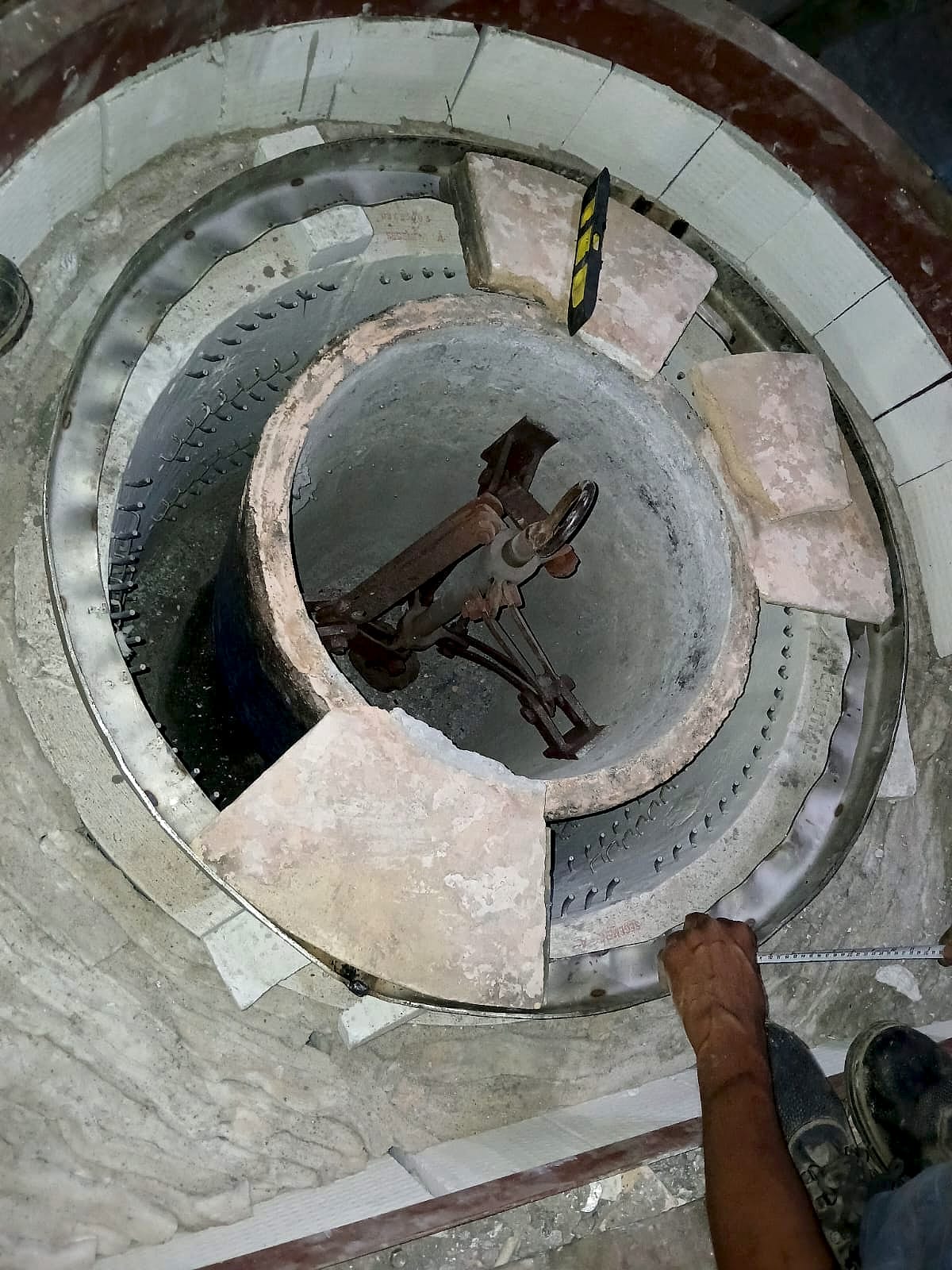 The crucible being seated inside the heating system