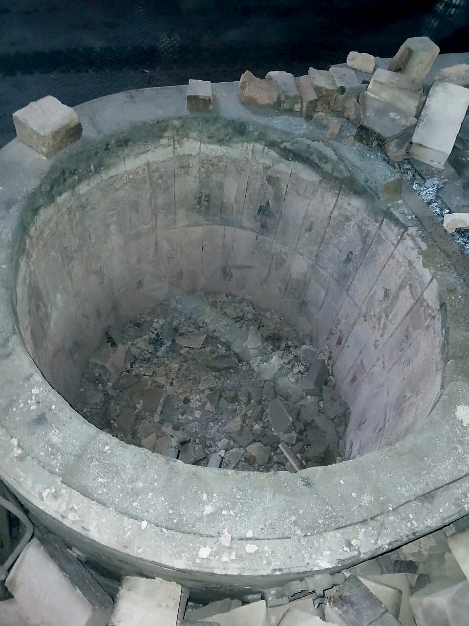 The crucible pit stripped of its old lining