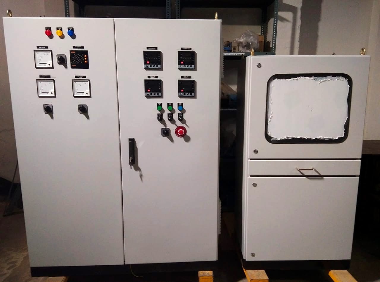 PLC control panel beside the PC cabinet for the SCADA