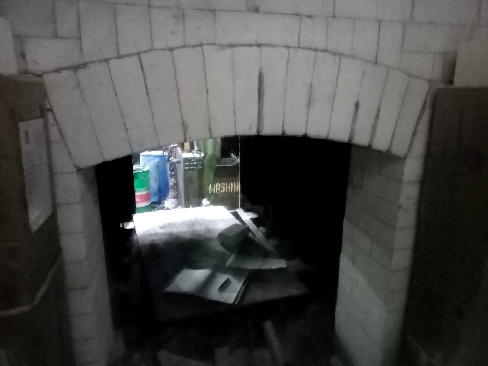 Arched brick lining at the chamber entry
