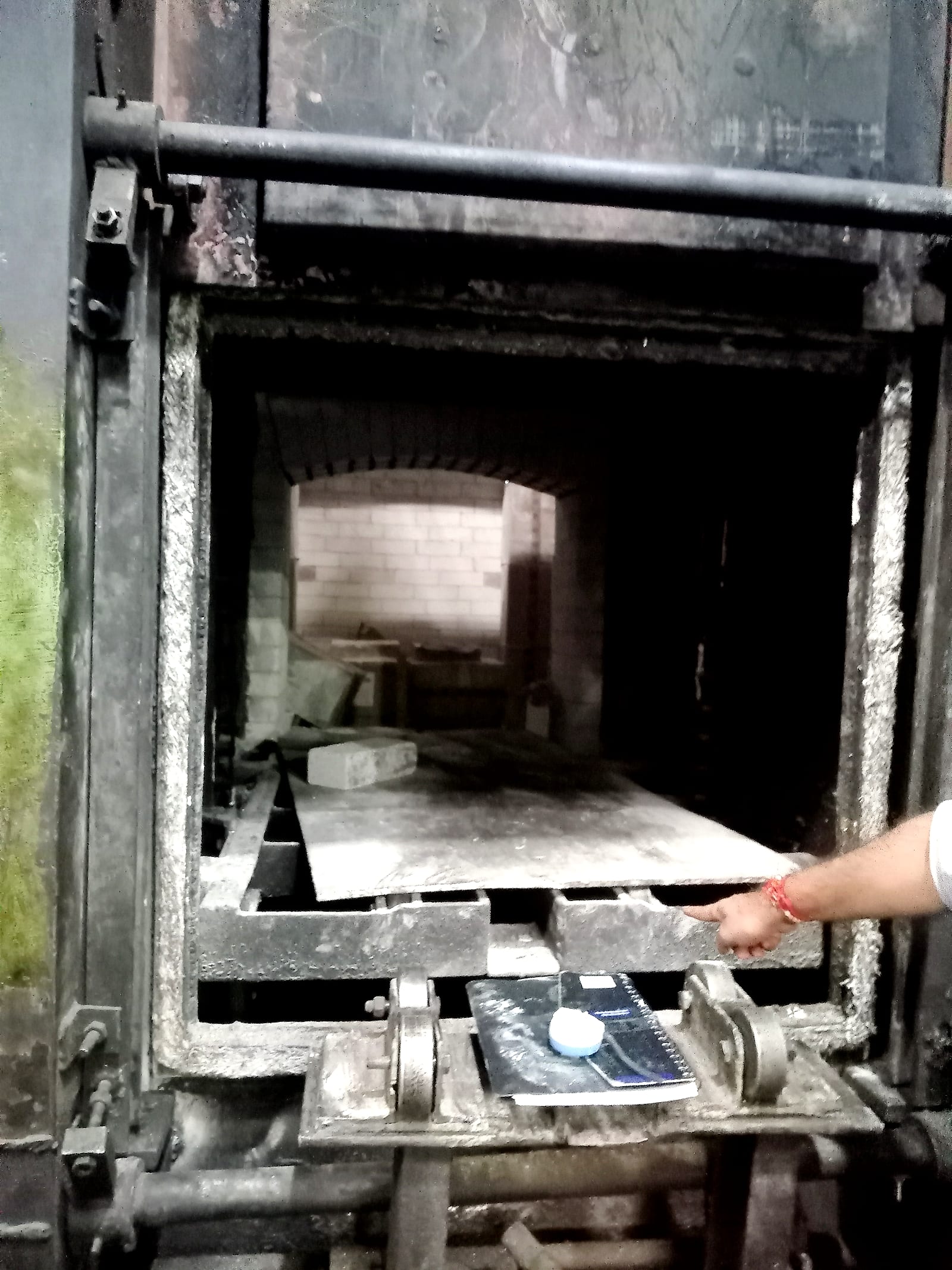 Furnace door open on the gas-fired chamber before the conversion
