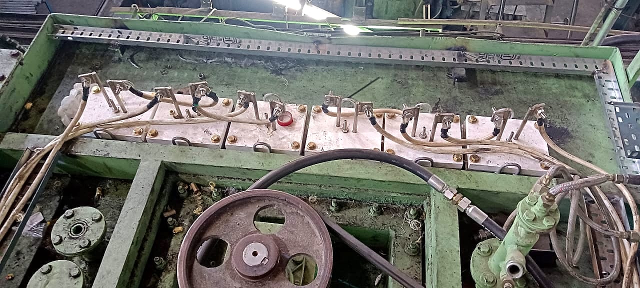 Heating element terminals wired across the top of the furnace