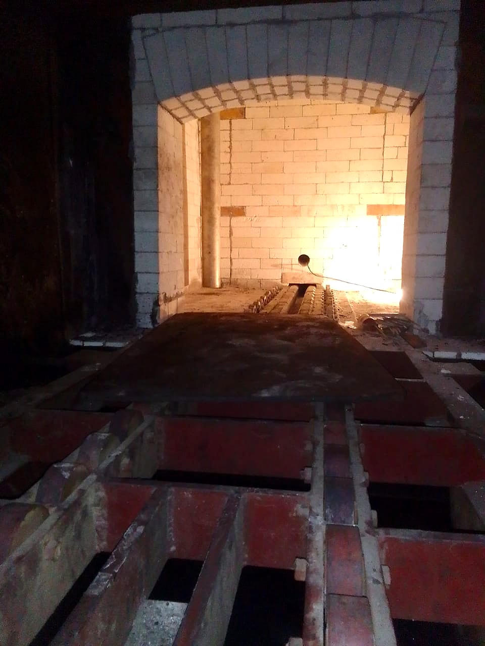 Radiant tubes mounted inside the brick-lined chamber