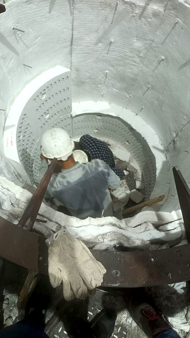 A technician fitting Fibrothal modules inside the pit