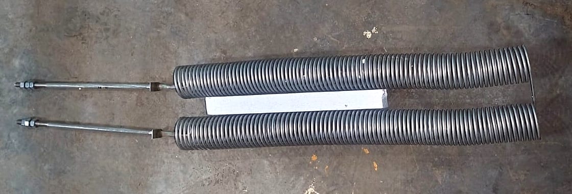 Coil type heating element: a wound wire coil with threaded terminal rods