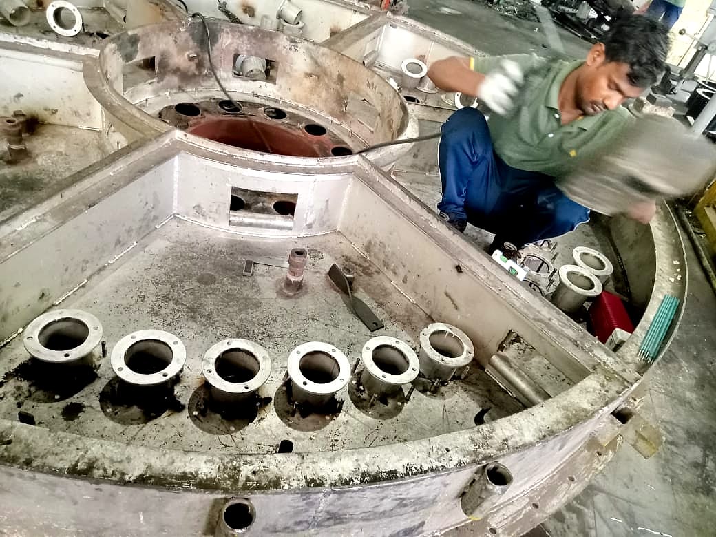 Work on the heater mounting base in the hood