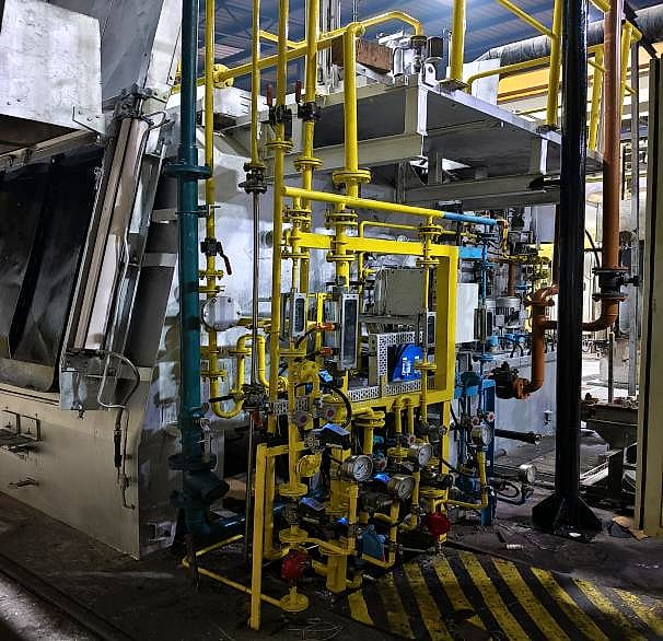 New atmosphere panel pipework and instruments beside the furnace