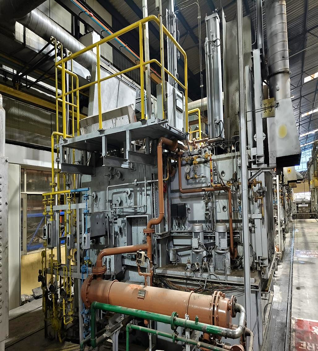 Furnace with the original water-cooled heat exchanger (orange, lower left)