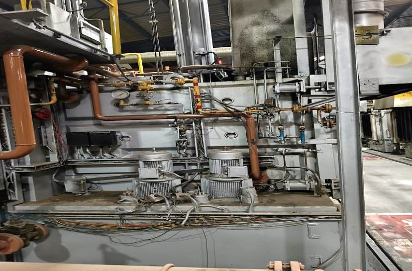 Furnace side before the retrofit, with the old field instruments and piping