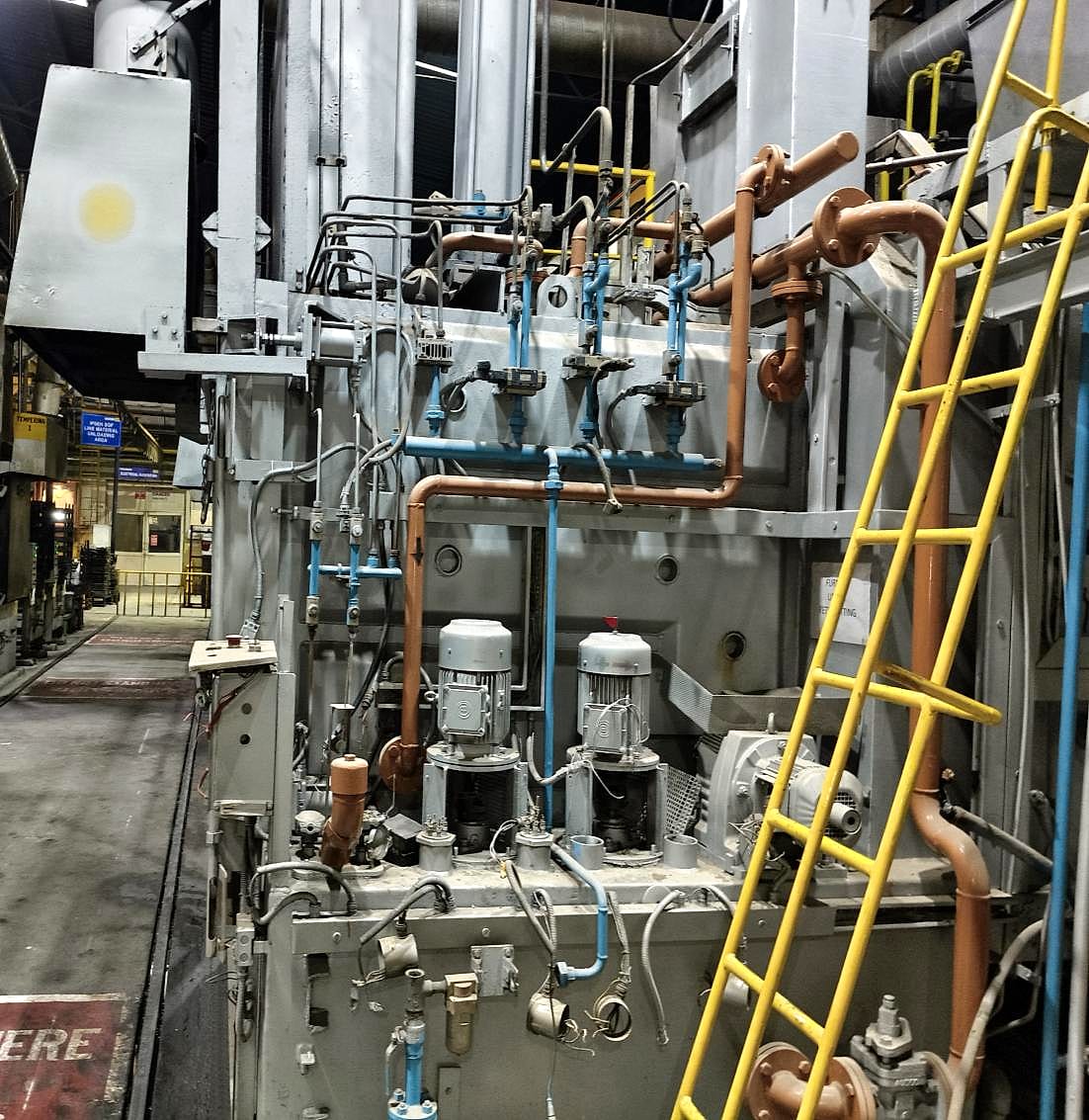 Quench end of the furnace before the upgrade, with the original oil level sensing